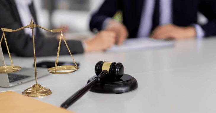 Solicitor and client discussing a workplace injury claim