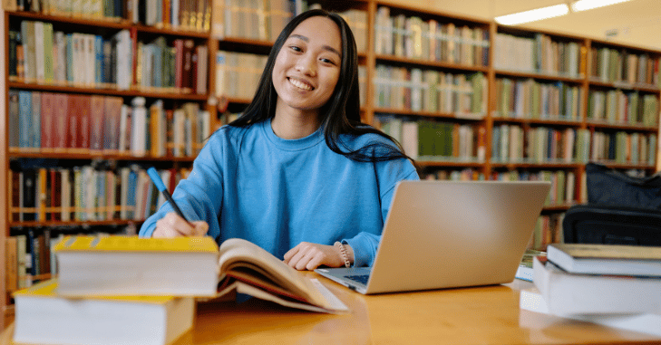 Researchers working quietly at long study desks