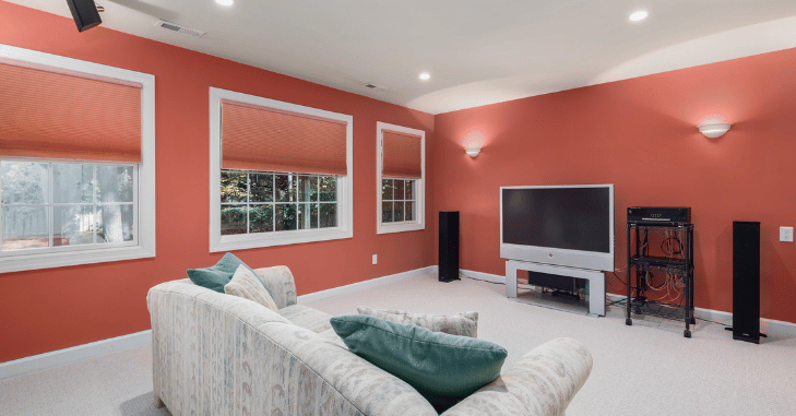 Neutral colour scheme making a small sitting room feel larger